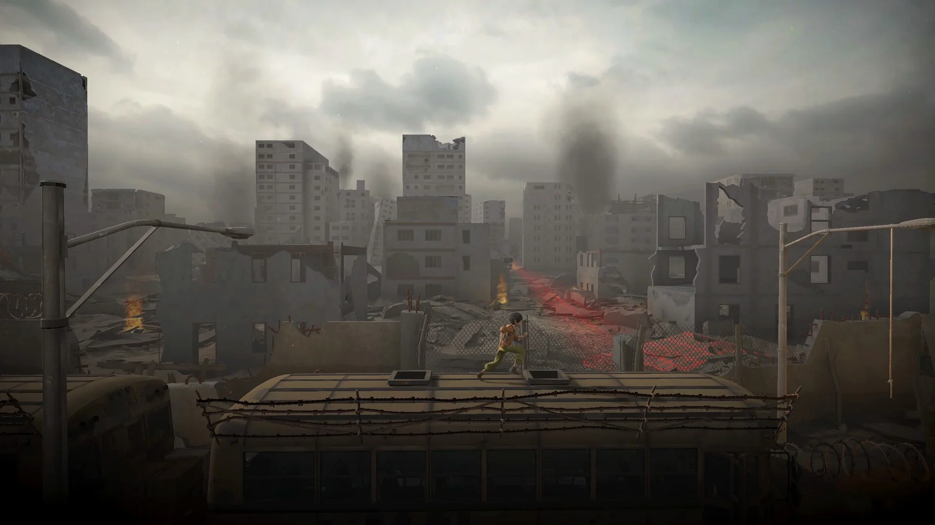 Child in green trousers running along a train roof through a ruined grey city, a red-lit street below the fence