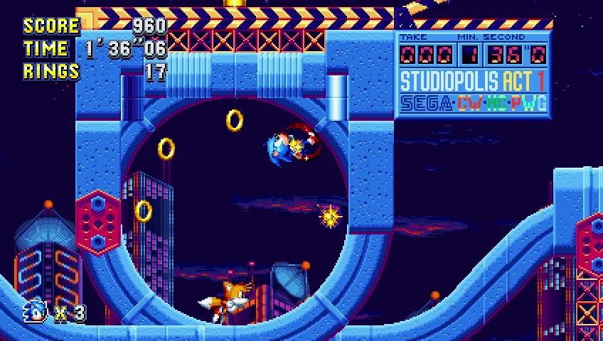 Sonic in a blue tube marked Studiopolis Act 1.
