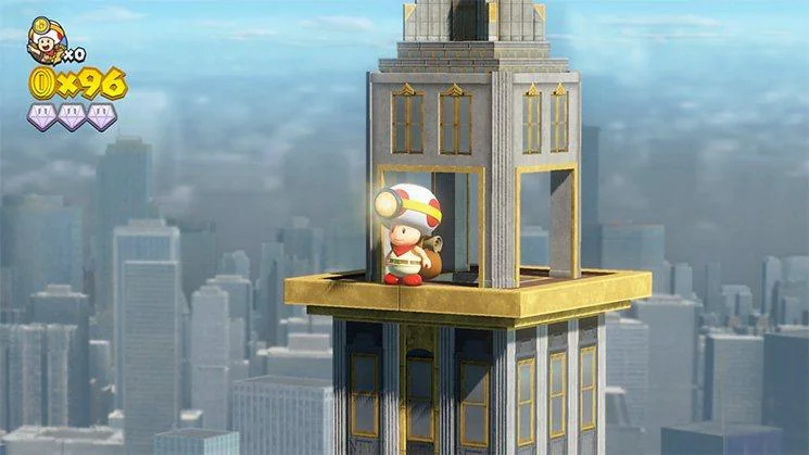 Toad on a skyscraper diorama above a city, coin counter visible.