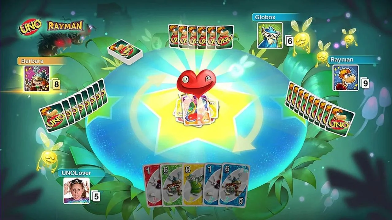 UNO Ultimate Rayman theme cards beside a discard pile