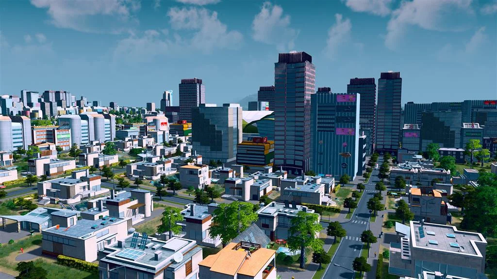 Suburban white houses with rooftop solar next to a cluster of glass office towers