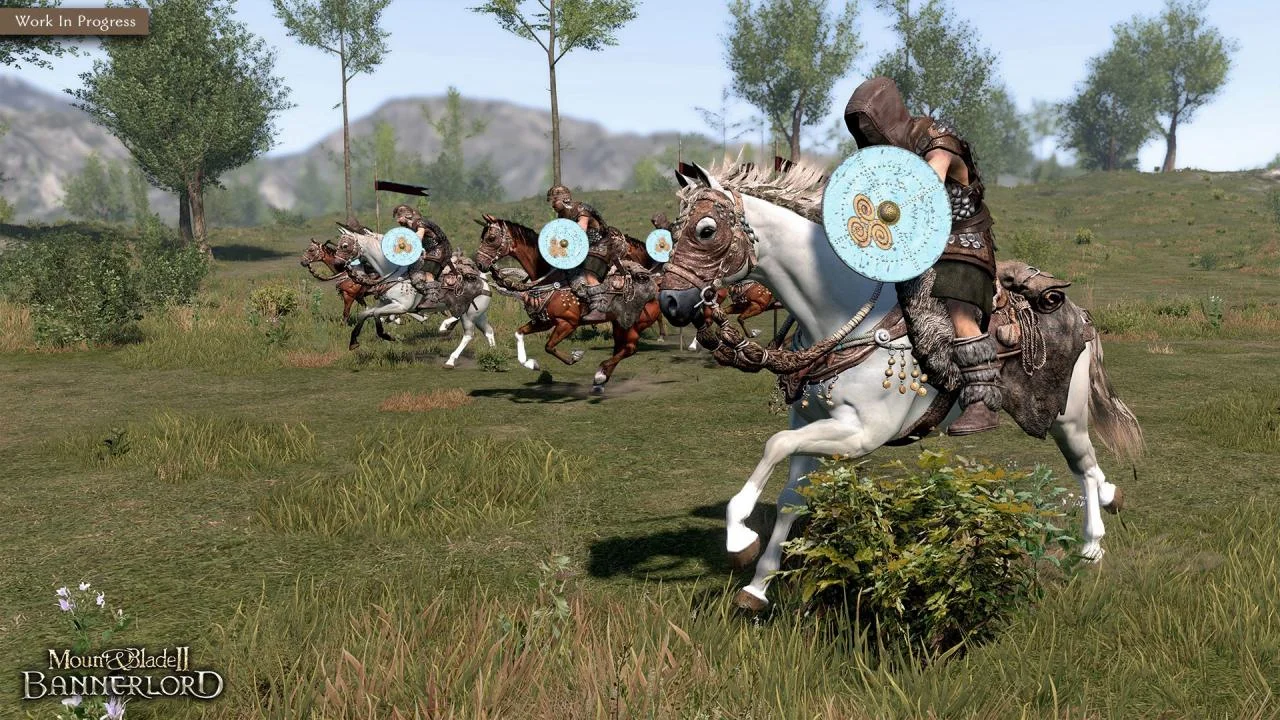 Hooded rider on a white horse with a pale blue three-spiral shield, four riders behind on a green hillside with trees