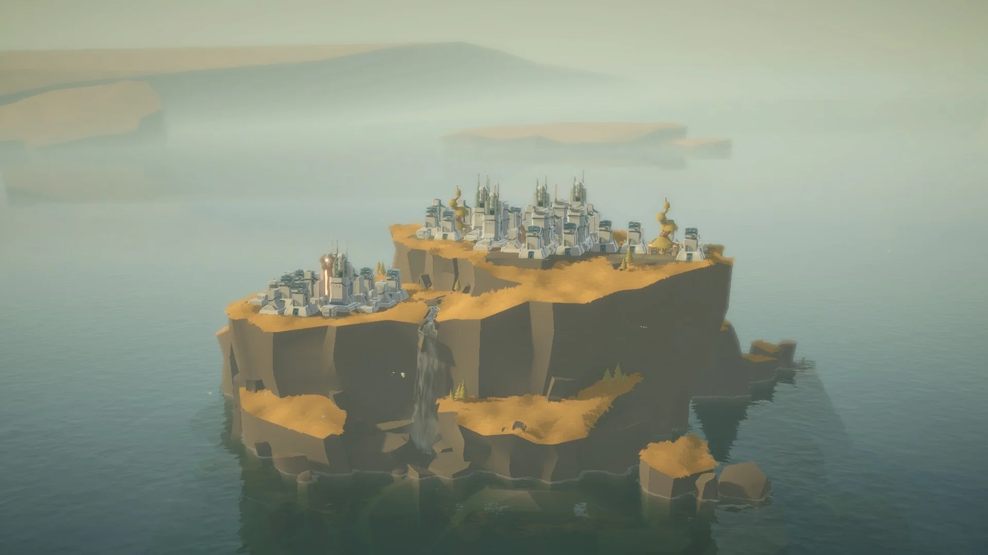 Distant cliff island with two white settlements, a thin waterfall, fog and sea around