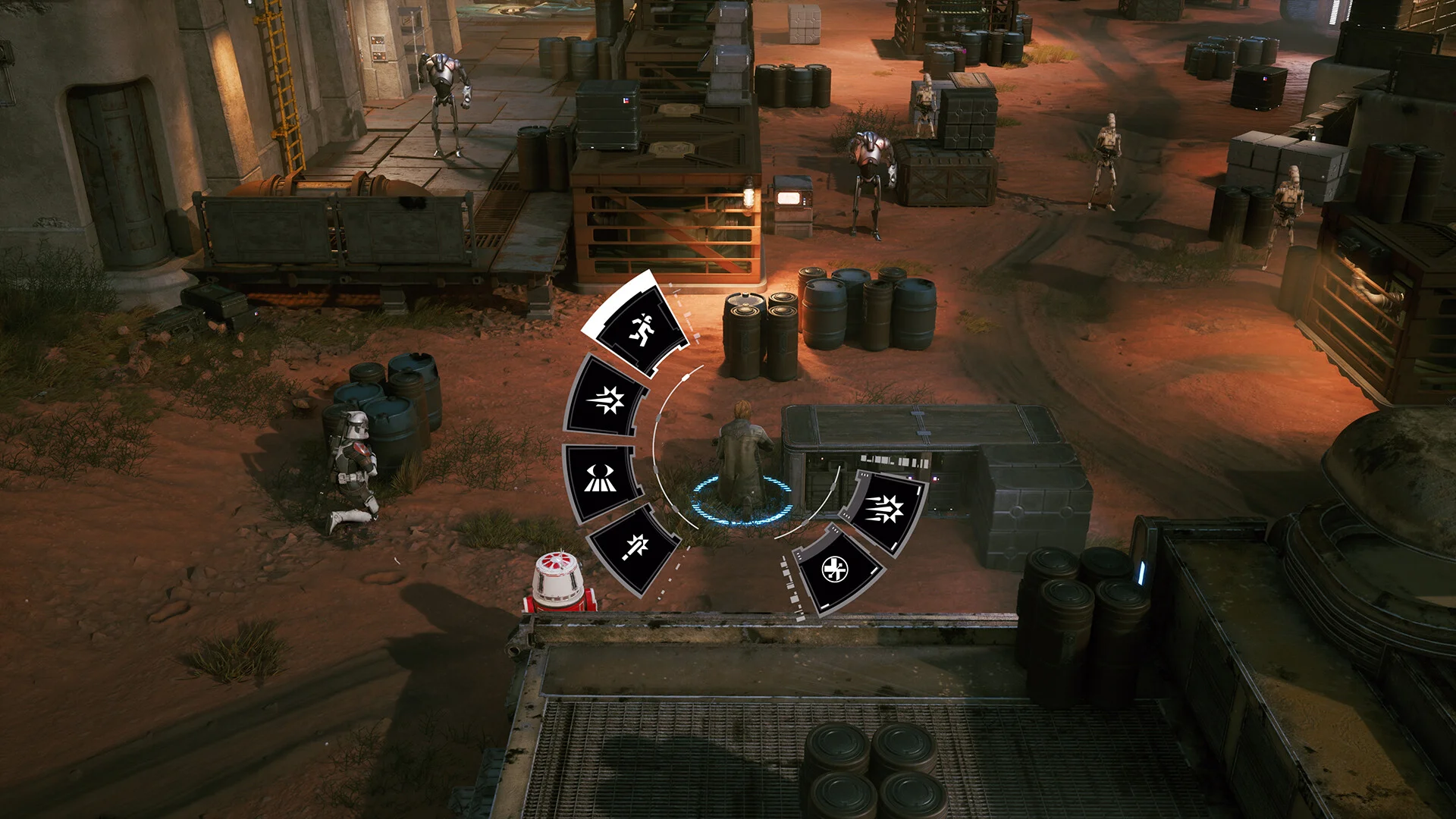Top-down tactics wheel on red dirt among barrels, crates and waiting droids