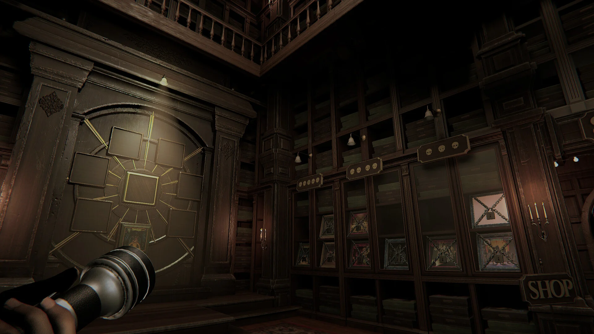 Two-storey dark library, gold-lined vault door with empty frames, glass cabinets with chained pictures, a Shop plaque, flashlight in the left hand