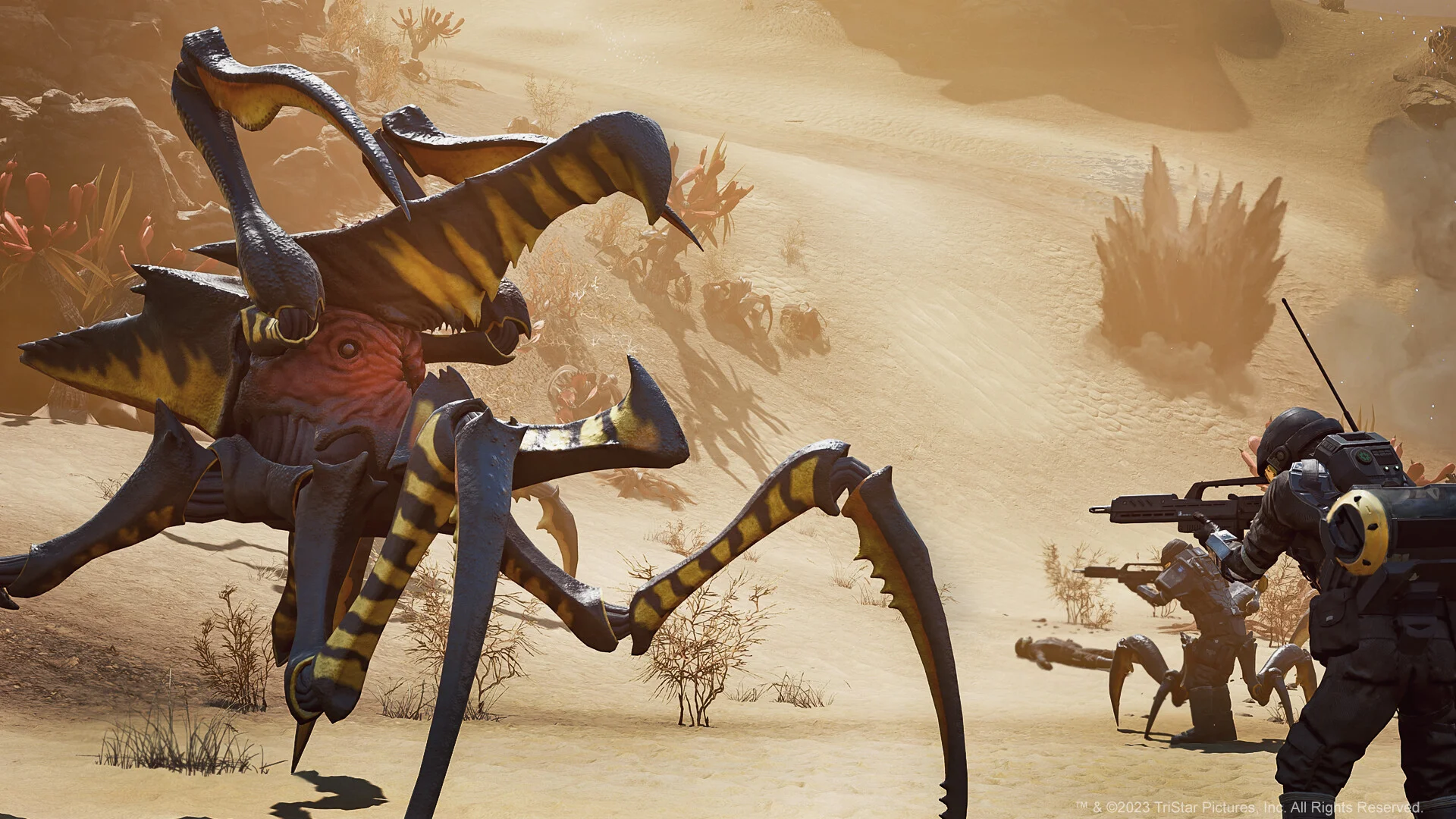 Yellow-and-black winged Arachnid charging two rifle troopers across orange desert sand