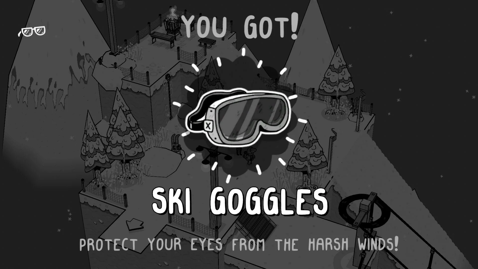 TOEM ski goggles pickup on a snowy mountain path