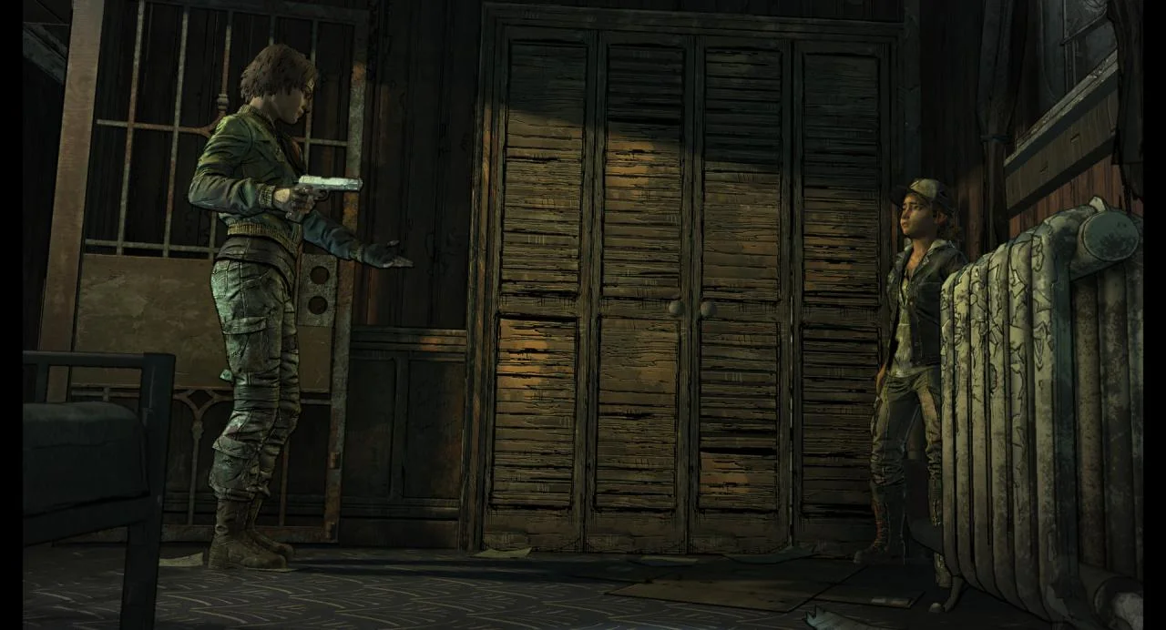 A woman aiming a pistol at a younger survivor in a boarded wooden room
