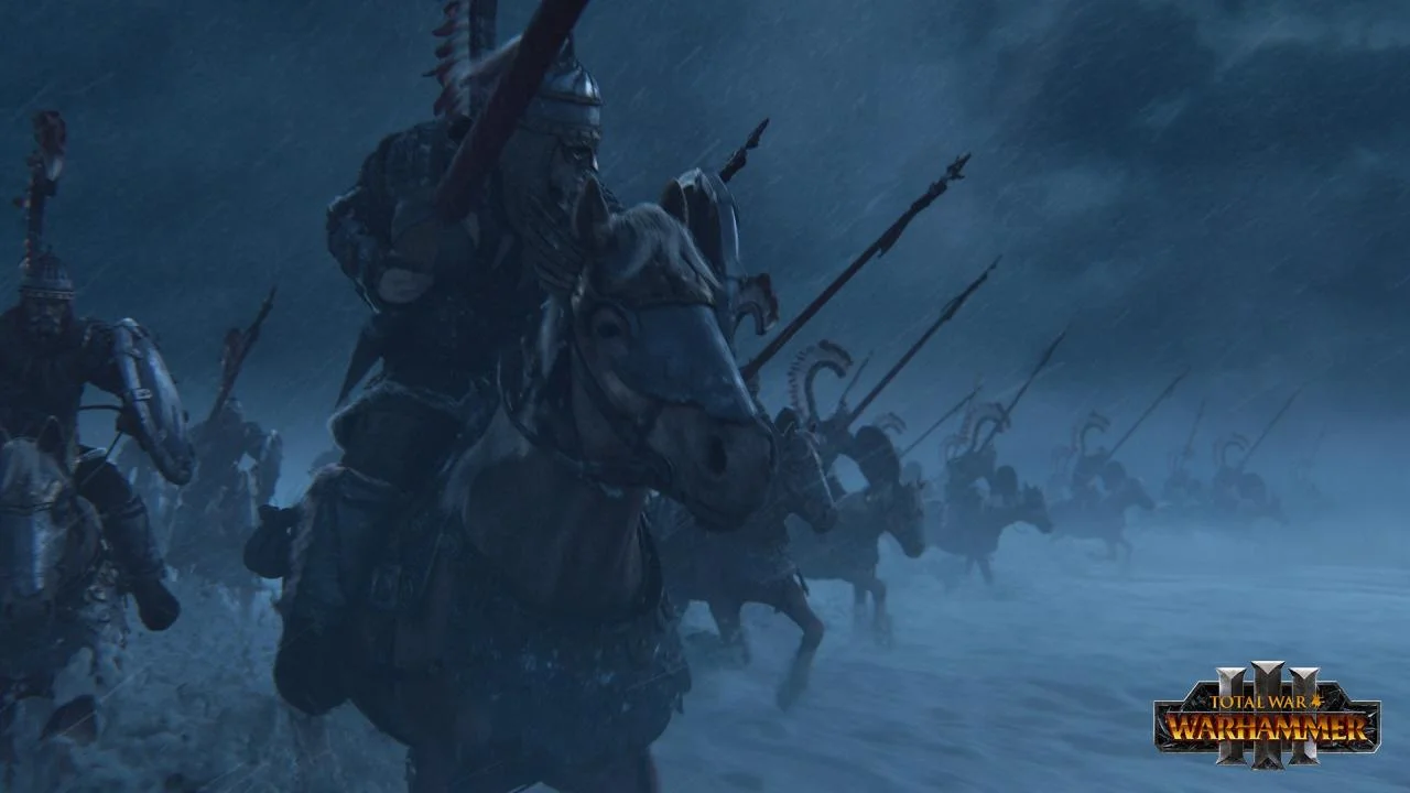 Kislev-style cavalry in winged helmets gallop through heavy snow with lances raised