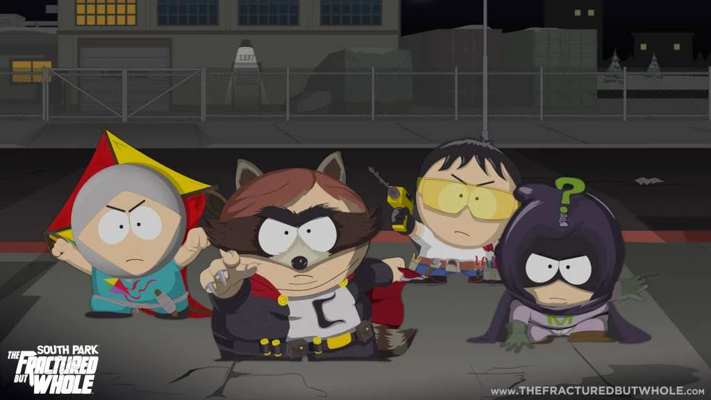 Human Kite, The Coon, Toolshed z żółtą wiertarką i Mysterion stoją na pękniętym asfalcie przy siatce