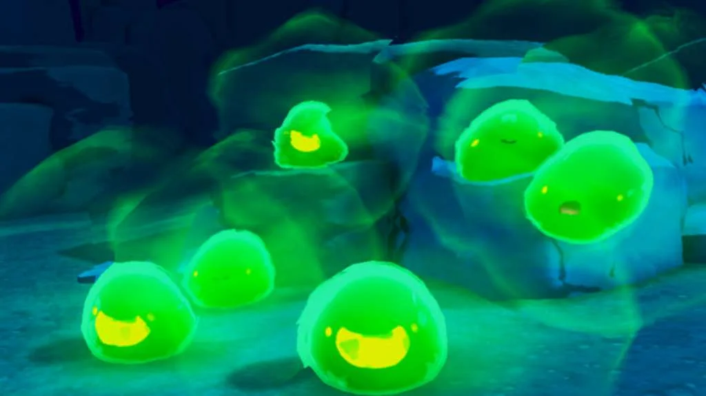 Cave of glowing green phosphor slimes with yellow faces on dark rocks