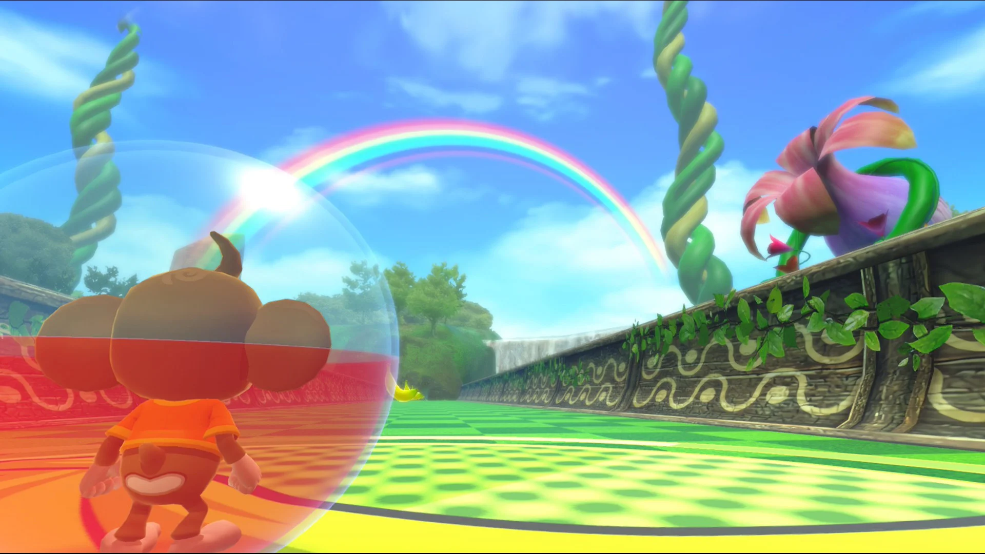 The same monkey rolls through a lava cavern with a pink creature on a ledge.