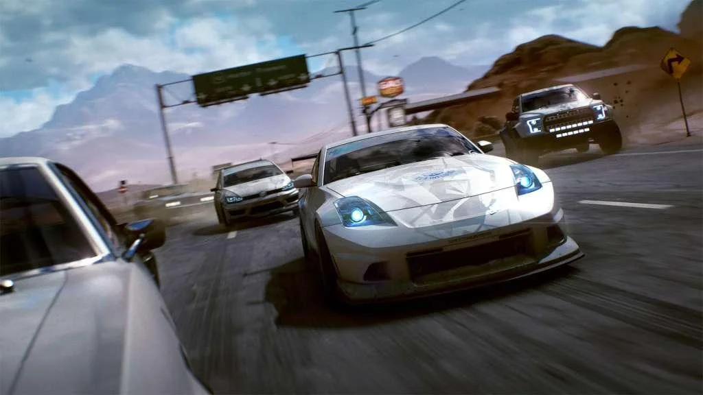 White sports car drifting on a desert highway.