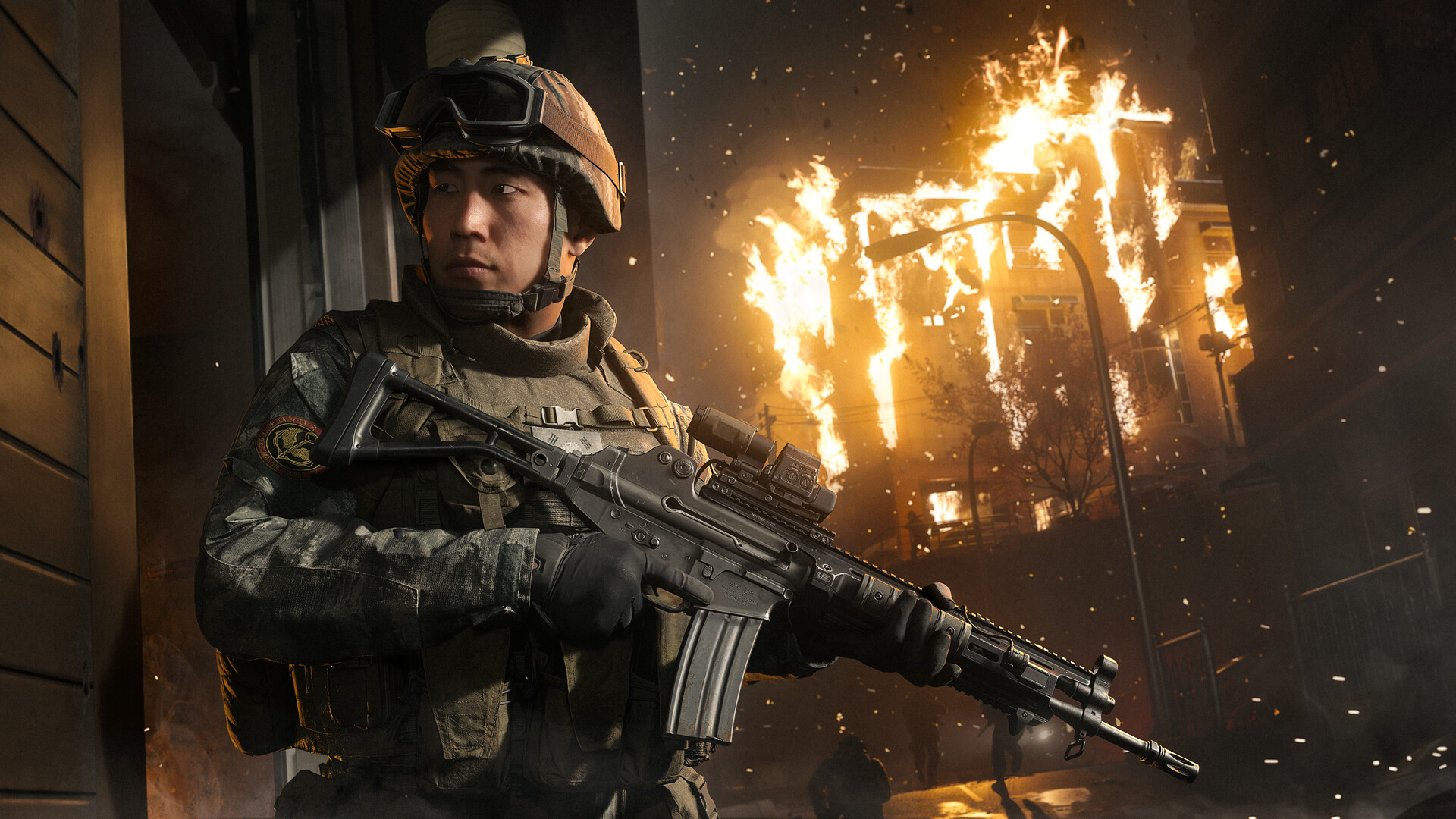 Call of Duty: Modern Warfare 4 campaign still of a South Korean soldier during a night firefight as a building burns behind him