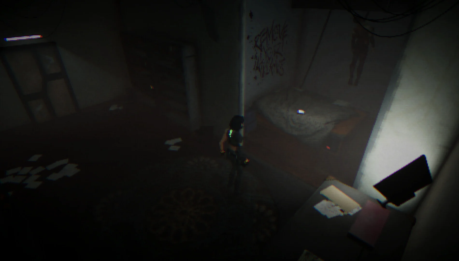 Graffiti room REMOVE THE NAILS above a bunk; woman with cyan pack on a circular rug, papers on the floor