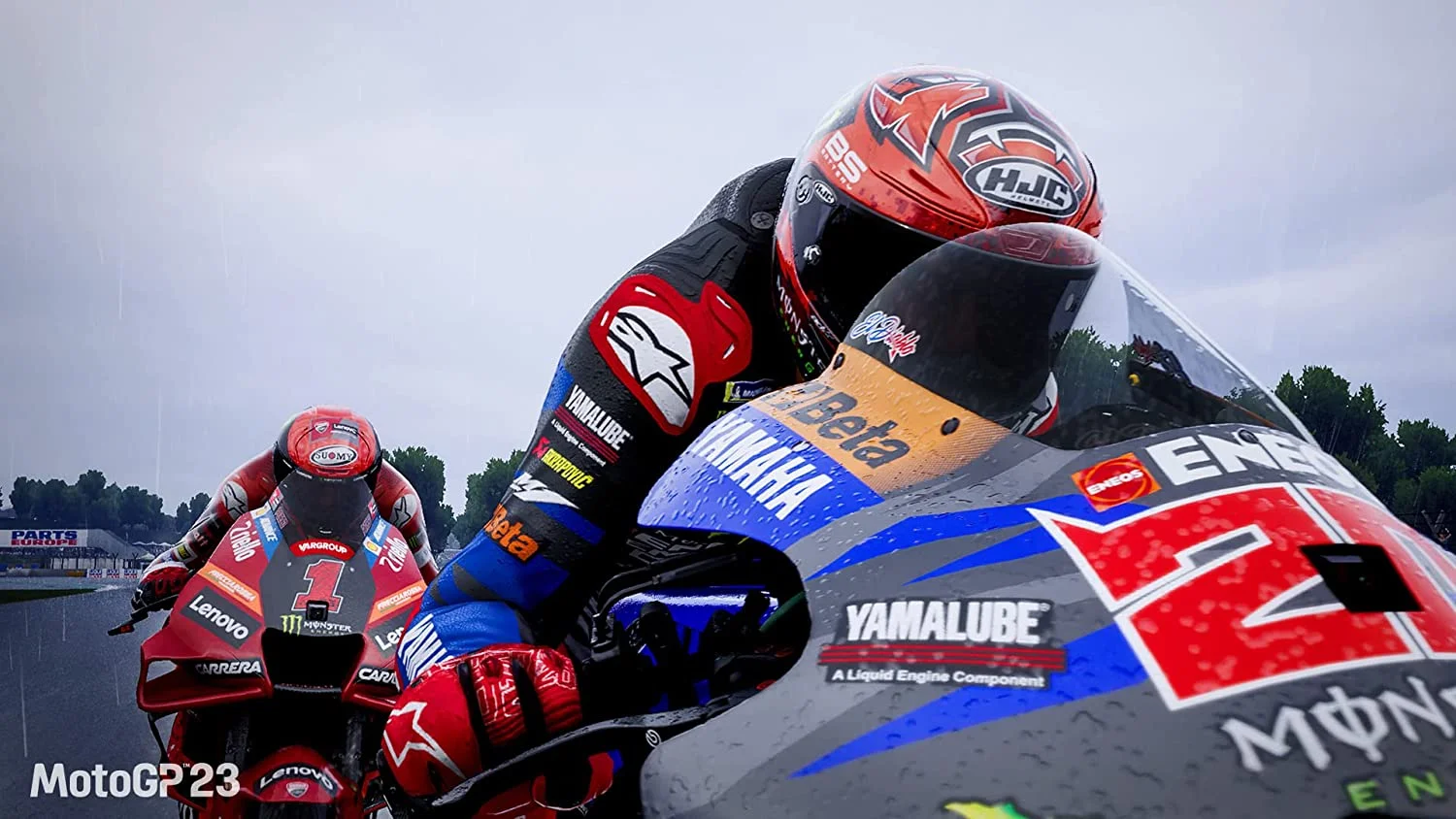 Close view of a red, white, and black helmet on a Yamaha bike.