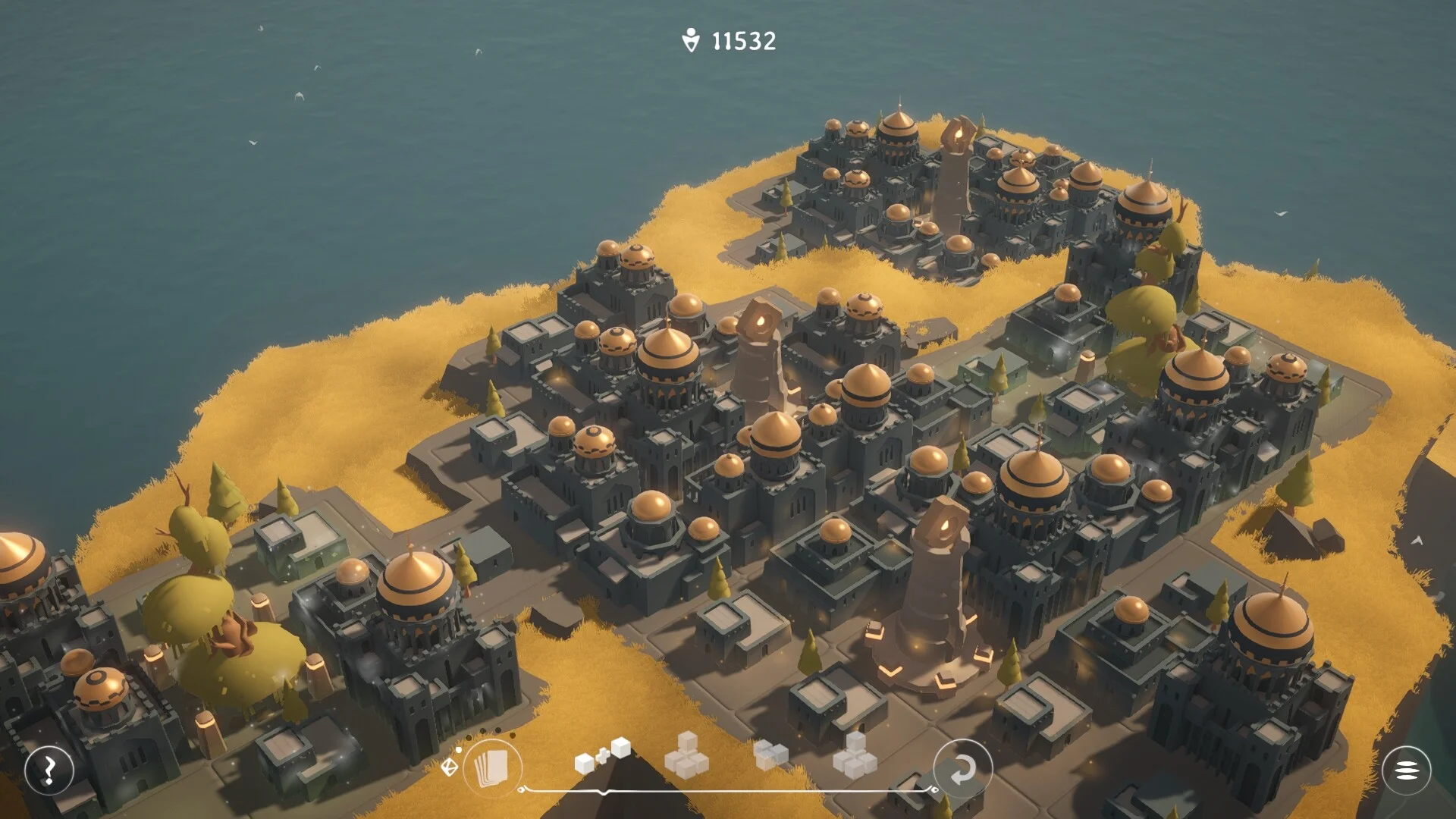Dark city of gold domes on a yellow-grass island, score 11532, building HUD along the bottom