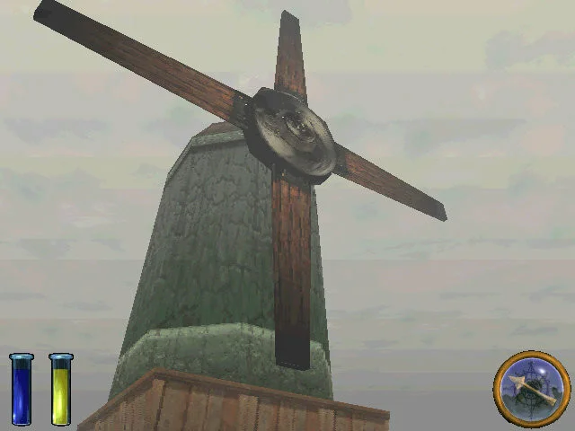 Green stone windmill with wooden sails, compass and two potion vials