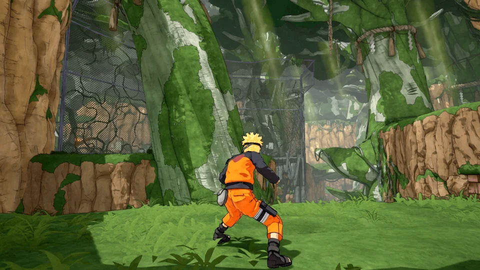 Canada listing: Naruto in orange facing mossy trees and a chain-link fence