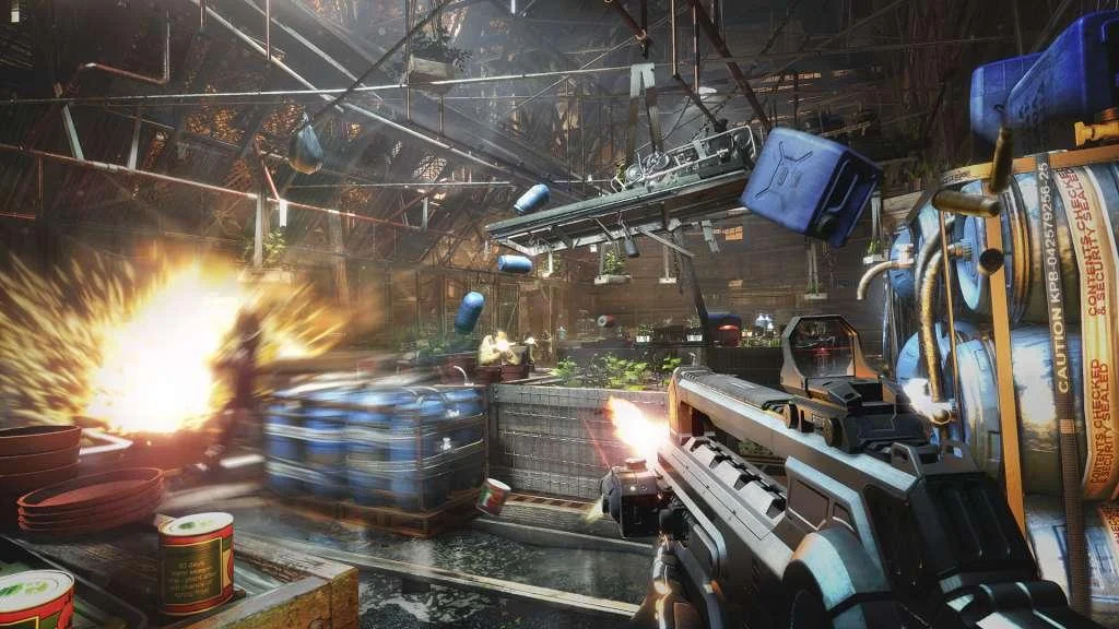 First-person rifle firing as blue barrels and a crate lift through a warehouse