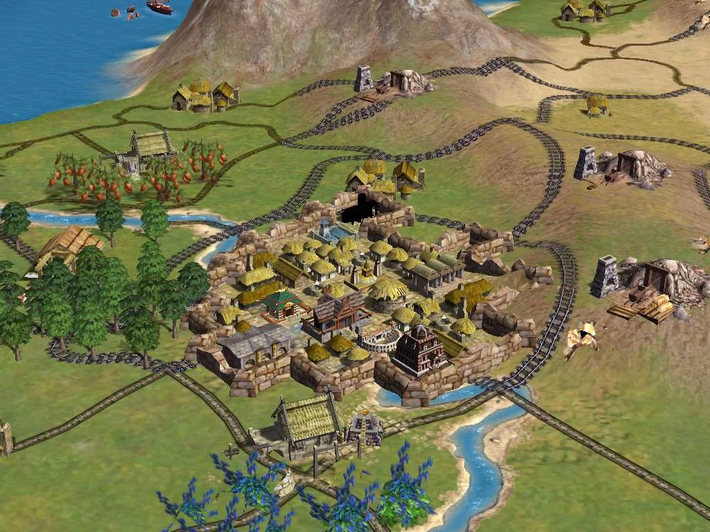 A walled city beside a river and a rail line