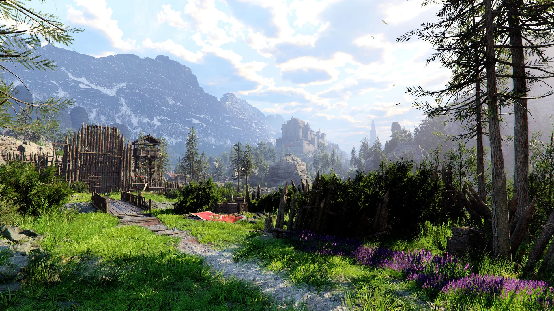 A green valley path toward a wooden palisade and a castle on a snowy mountain