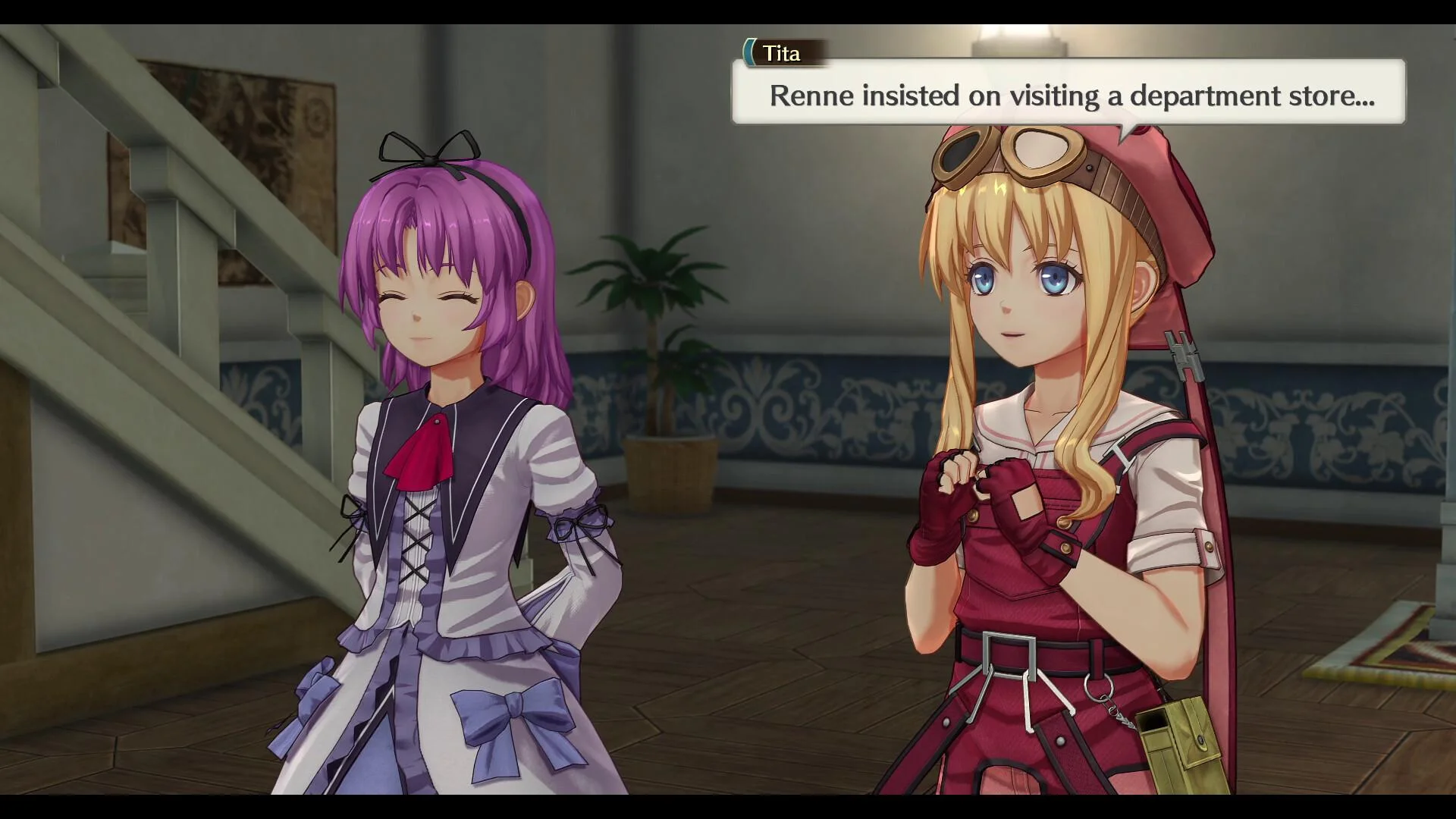 A purple-haired woman and a blonde woman talking in a bright room