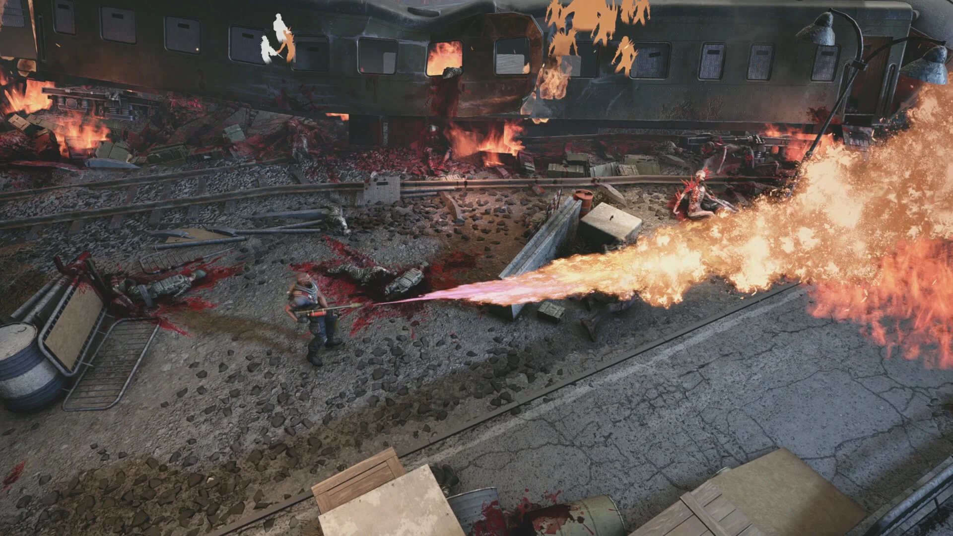 Soldier firing a flamethrower on a bloody road, overturned green train carriage behind