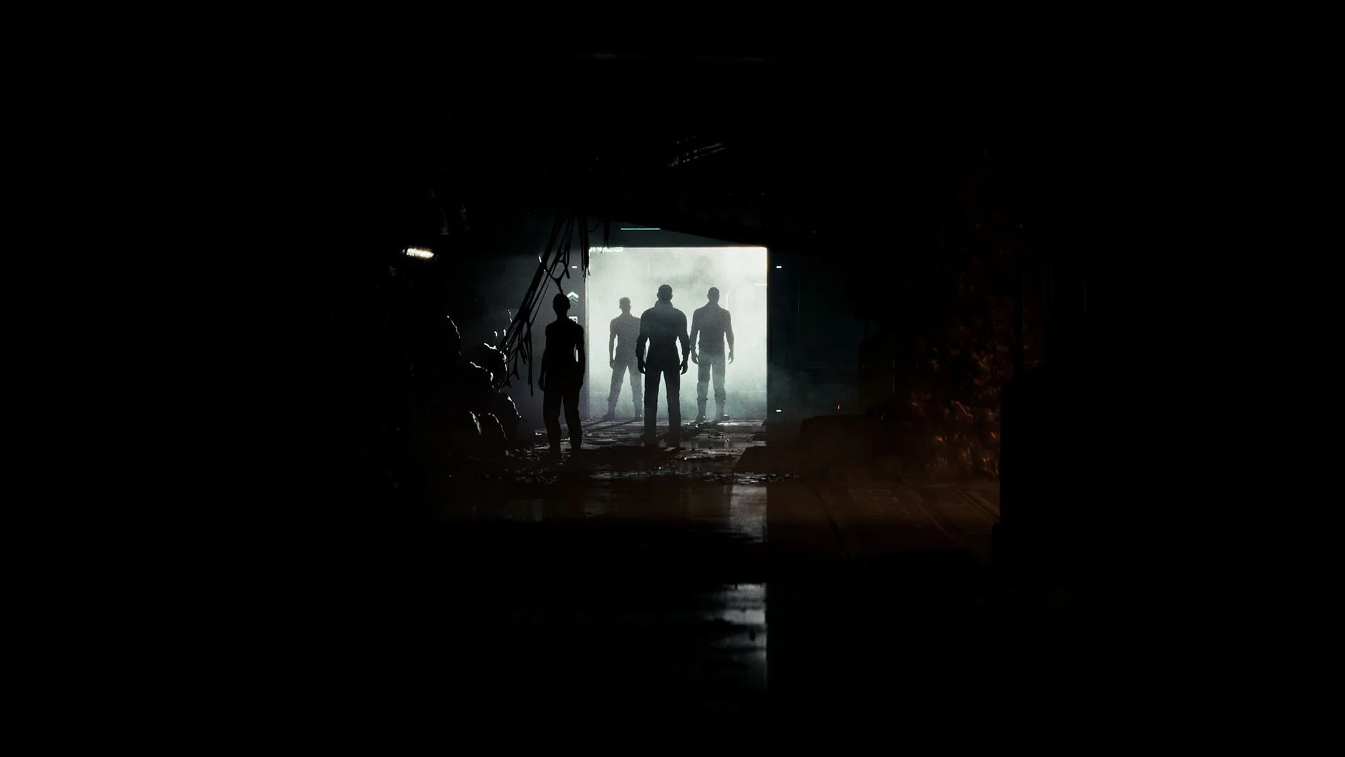 Four silhouettes stand in a bright doorway down a dark corridor