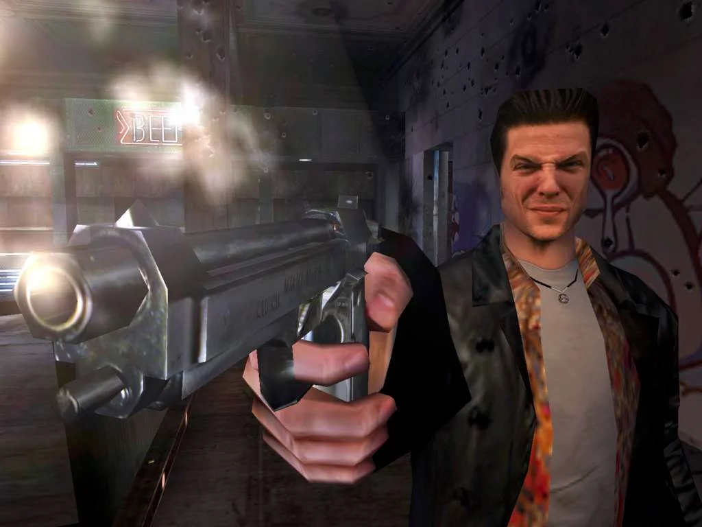 Max Payne aims a shotgun toward the camera in a beer-neon corridor