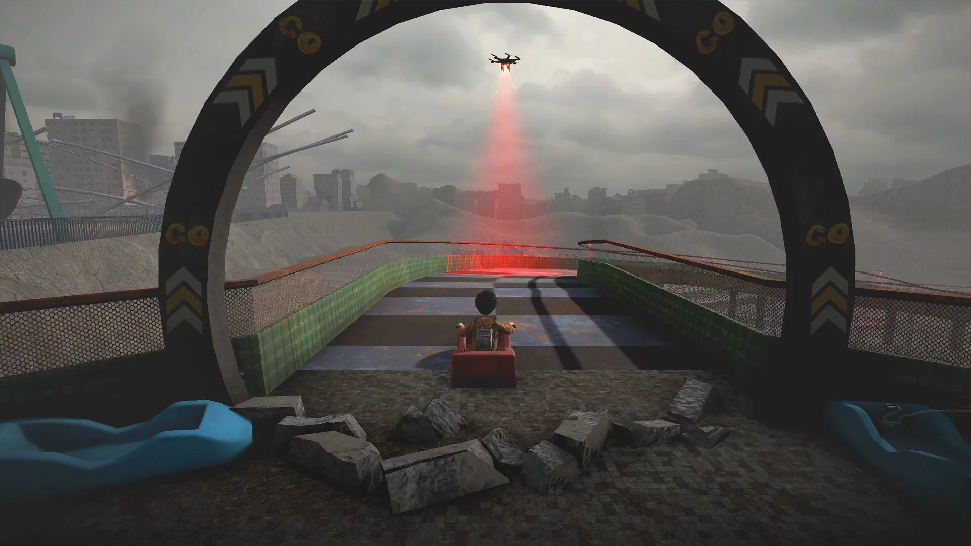 Child sitting on a red bumper car under a GO arch, a drone with a red beam above a striped track and blue ride boats