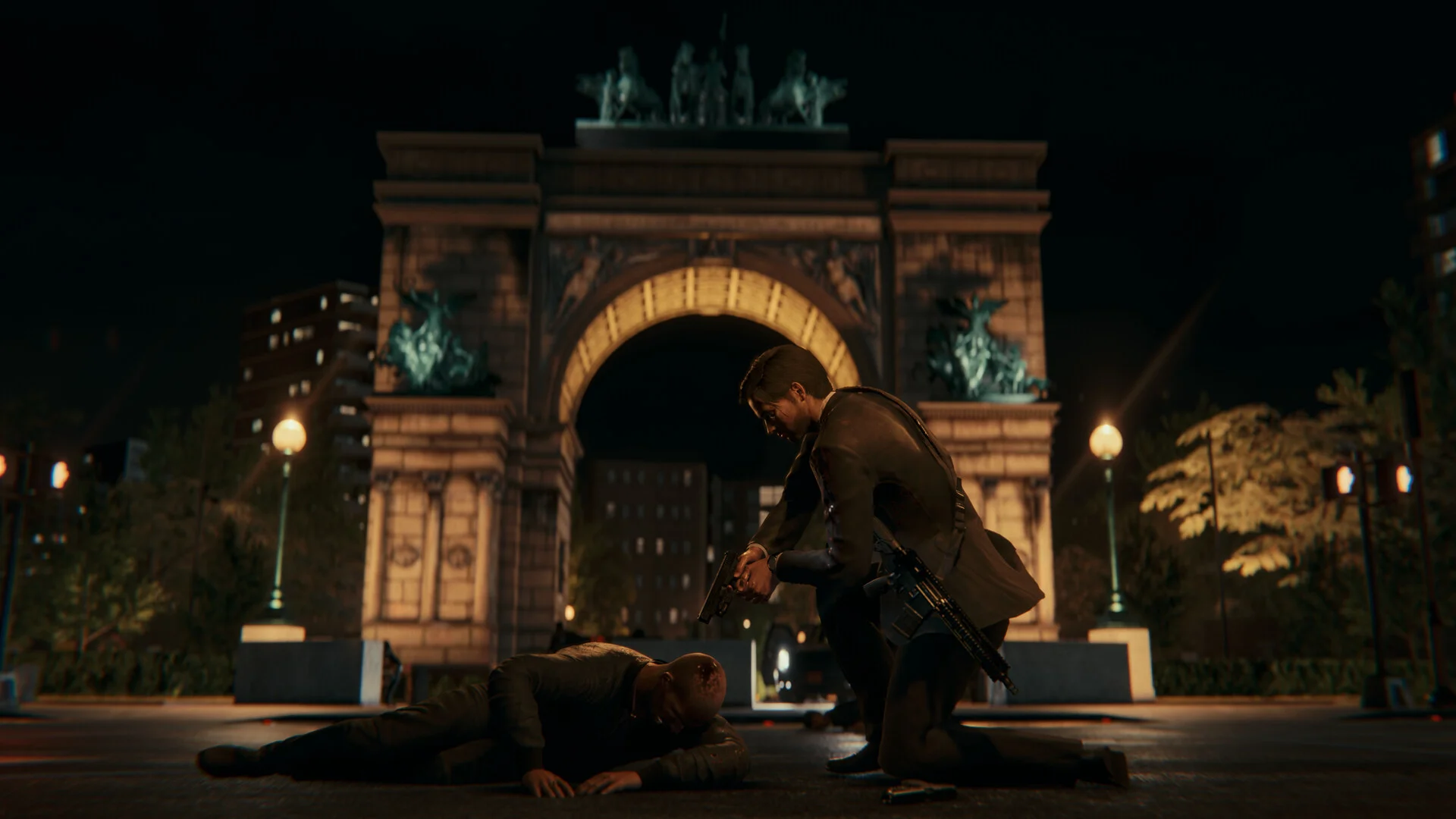 Kneeling man with pistol and slung rifle beside a fallen body, Washington Square Arch lit behind
