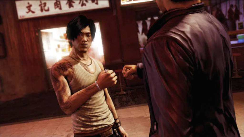 Night street under a shop sign with Chinese characters: a man in a white tank top faces a man in a dark leather jacket