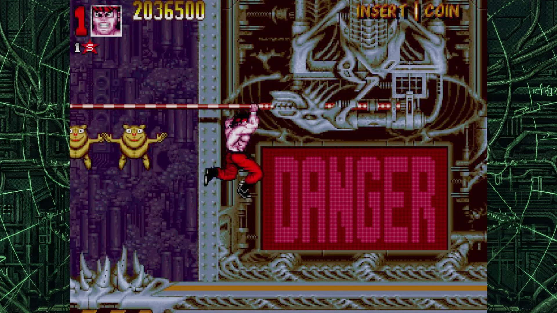 Shirtless hero in red trousers hanging from a striped pole above a red DANGER board, two yellow blob creatures, Insert Coin and a giant robotic mural