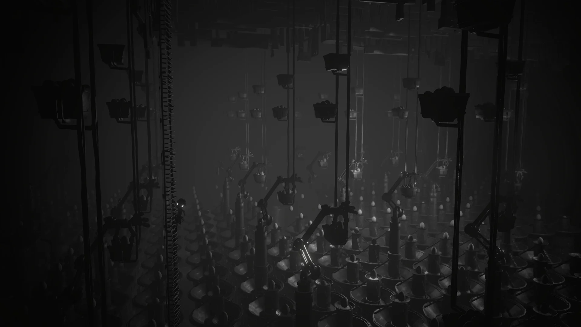Dark factory hall, hanging arms over rows of egg cups, tiny figure on a ladder at the left edge