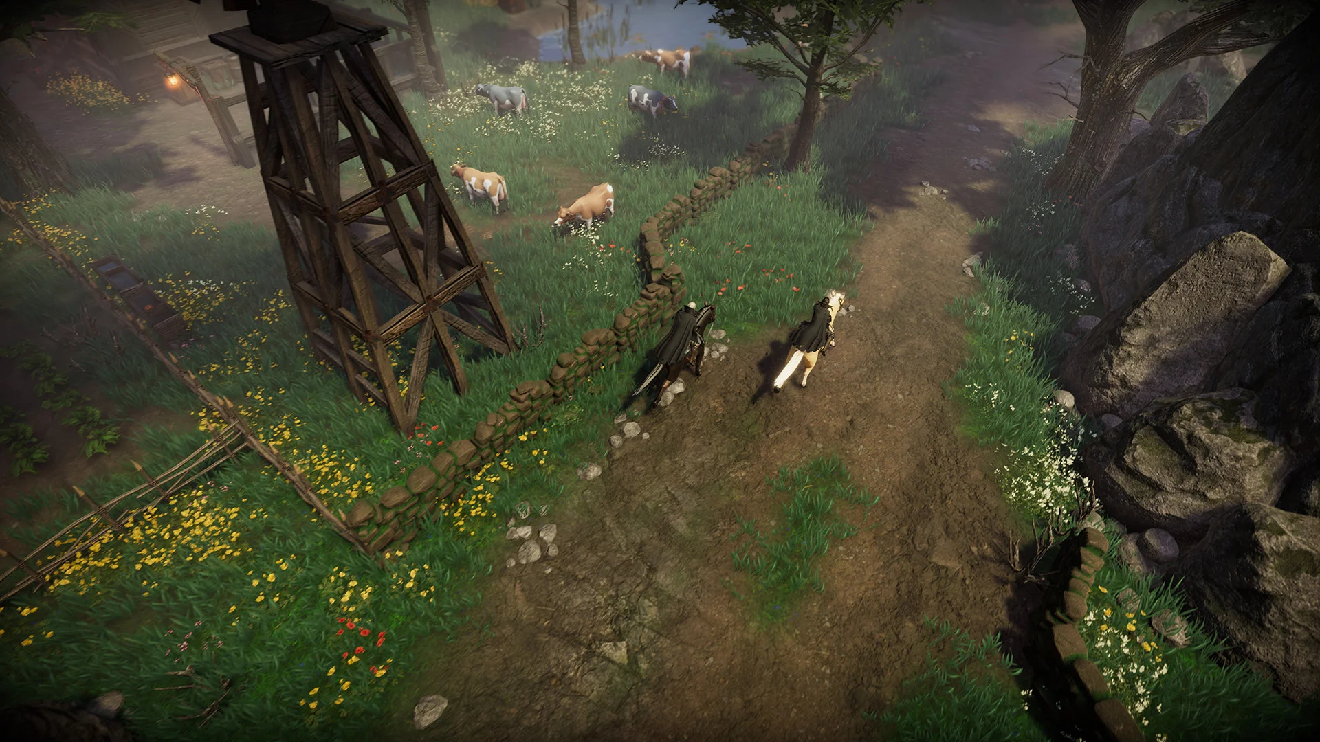 Two riders follow a dirt path past cows, a wooden tower, and a stone wall
