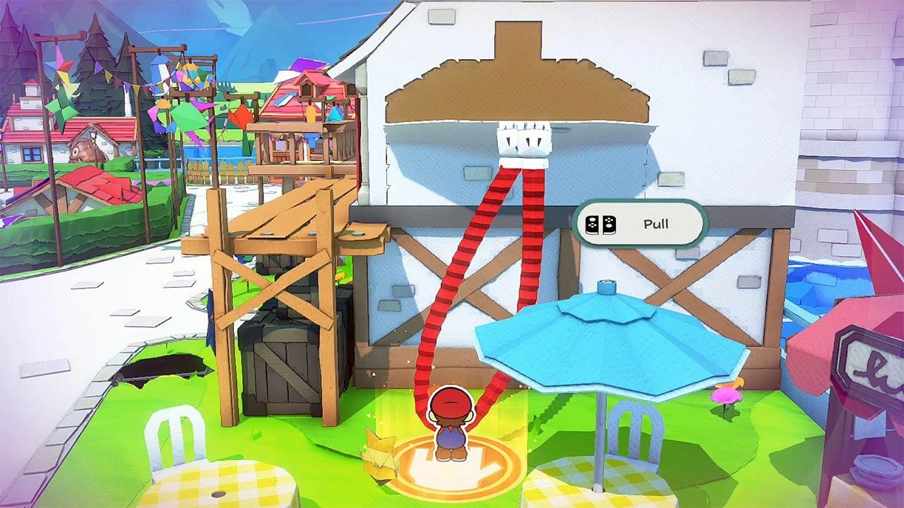 Mario beside a cardboard barn and a blue folded figure in a bright field.