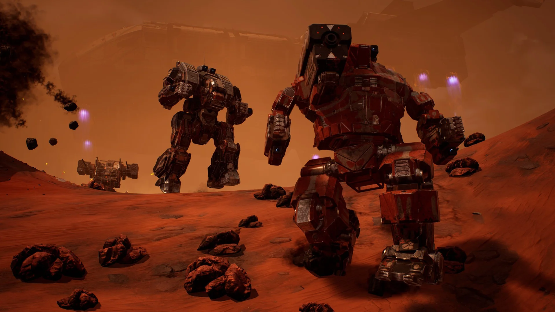Red and grey BattleMechs walking a red desert slope under purple tracer fire