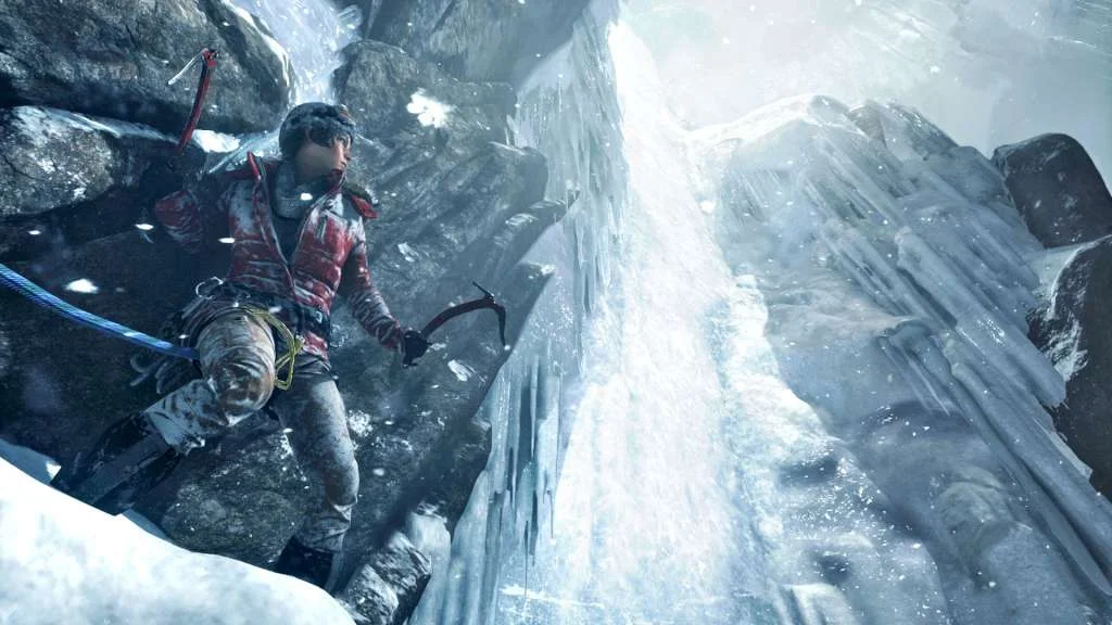 Lara Croft ice-climbing a frozen waterfall with two axes