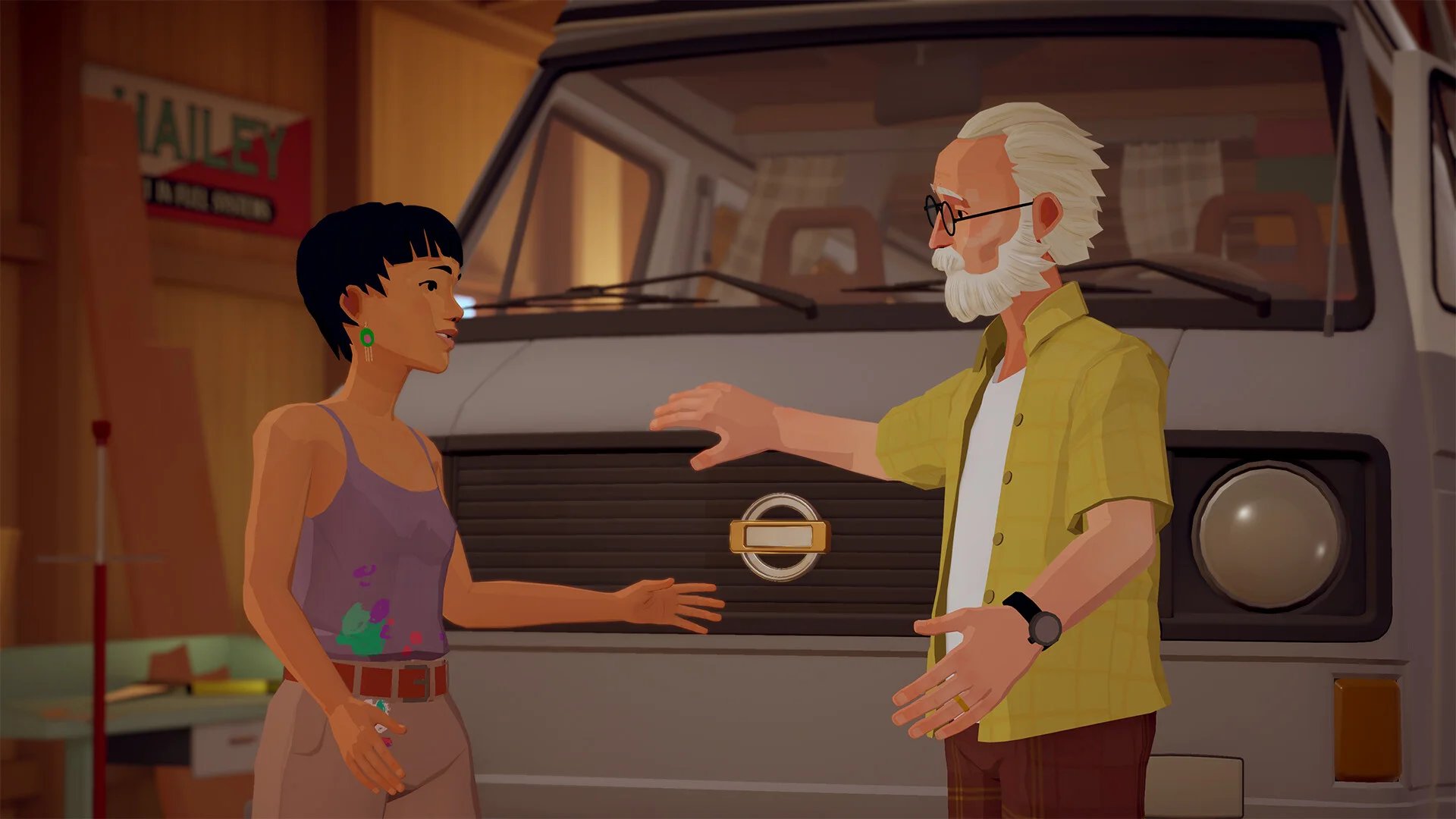 Short-haired woman in a paint-stained purple top talks with a bearded man in yellow beside a grey van in a wooden garage marked HAILEY