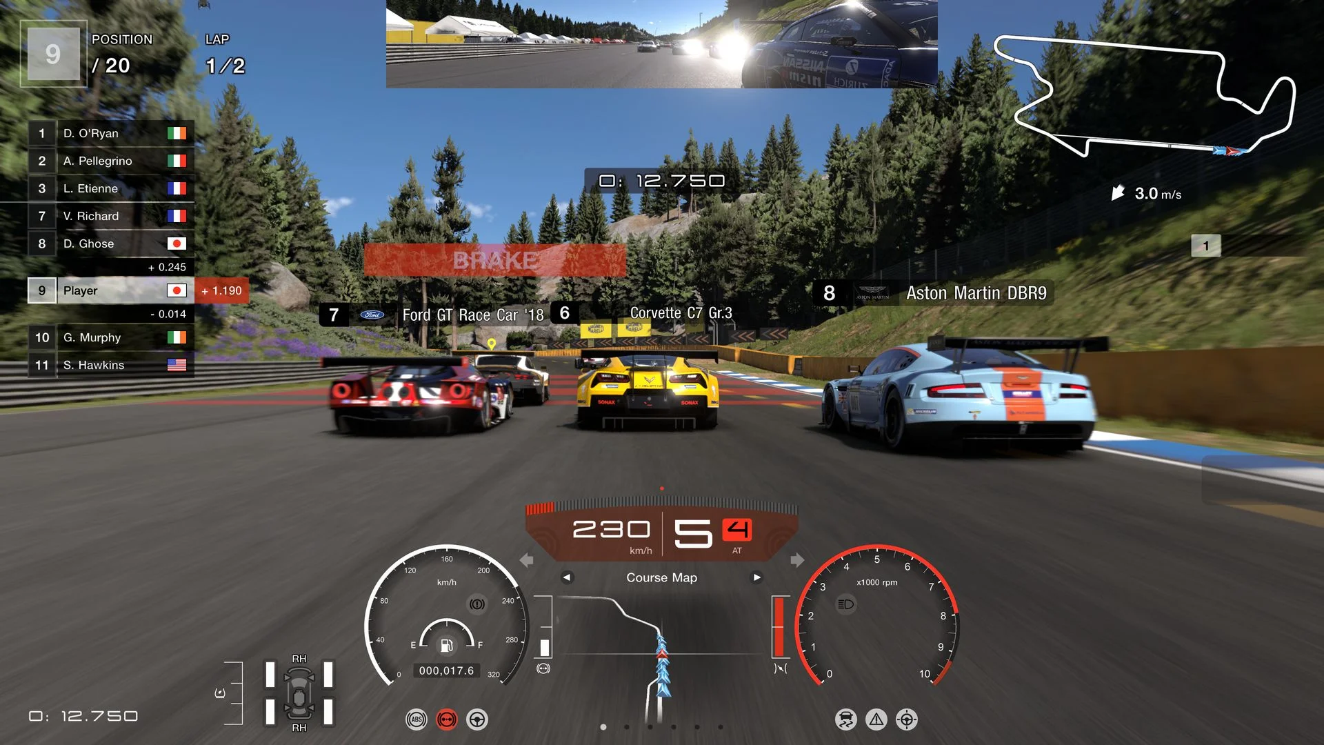 Chase view of yellow and white cars on a forest circuit with a minimap.