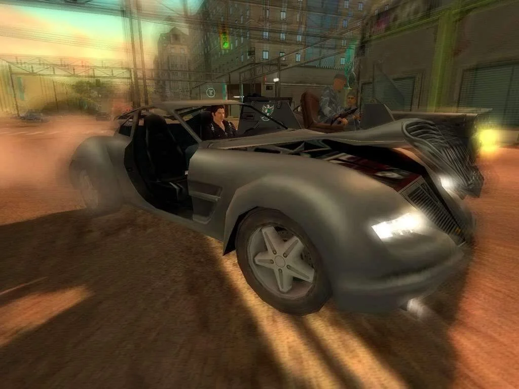 A dark sports car on a dirt track with a parachute behind it.