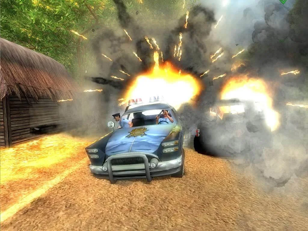 A blue car explodes on a dirt road.