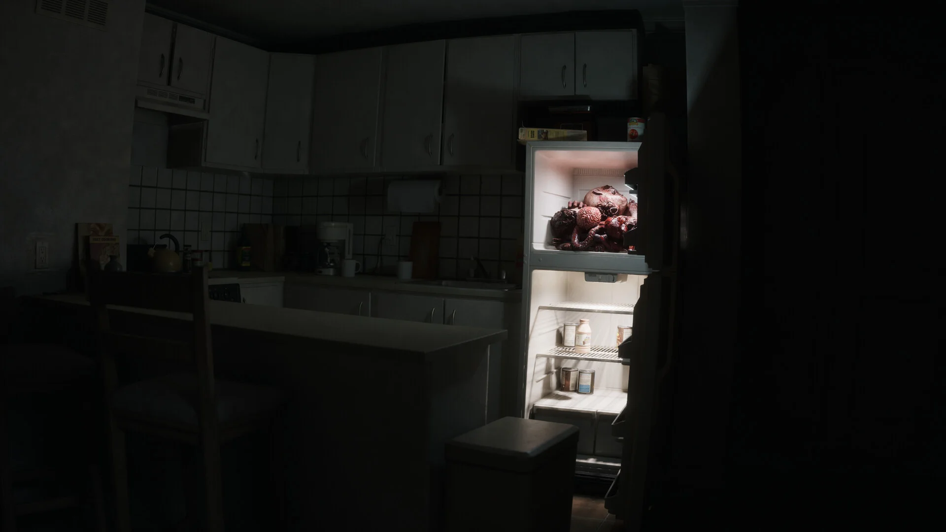 Dark kitchen: open fridge glowing, a pile of octopus tentacles on the top shelf beside a milk bottle
