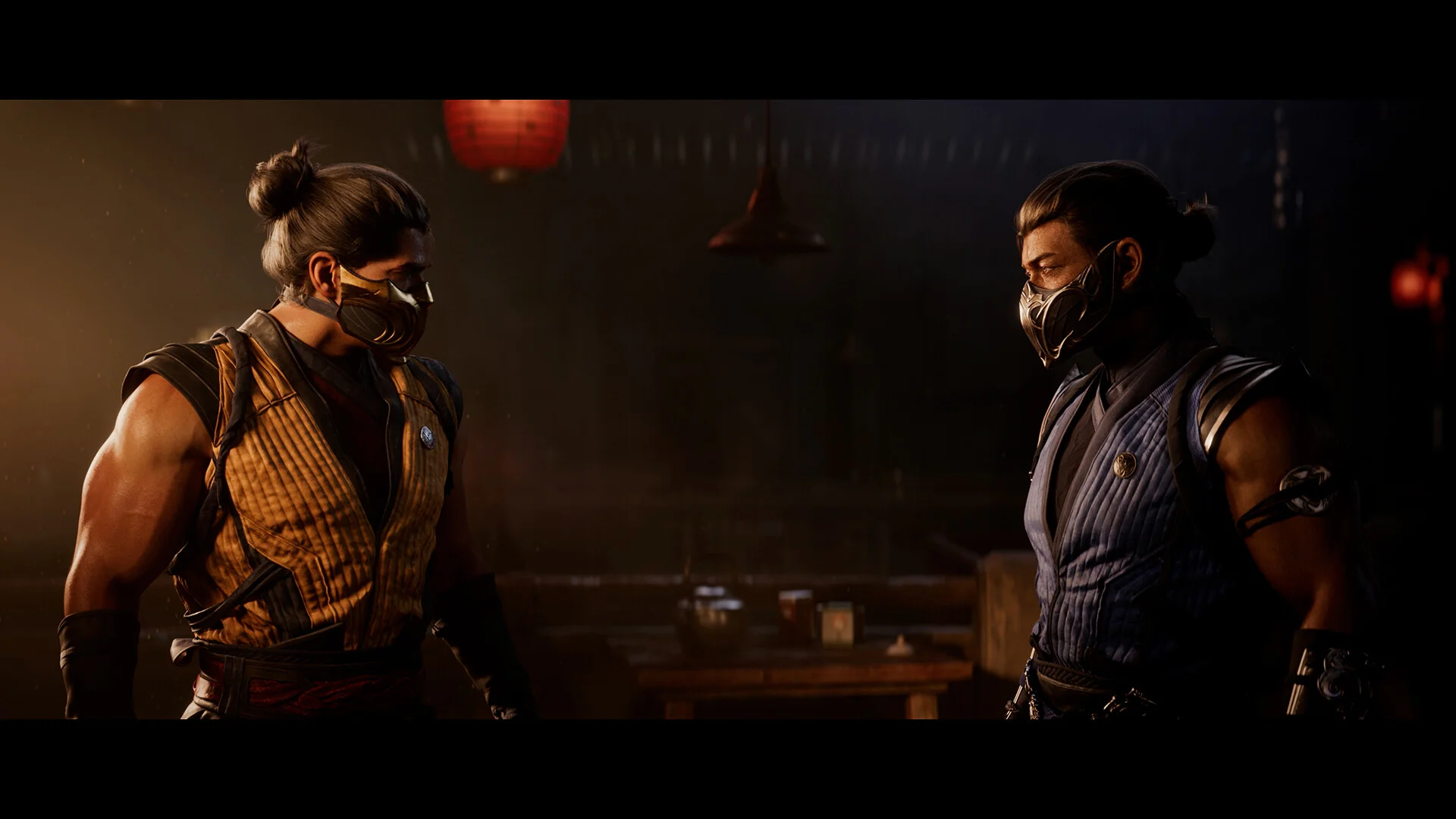 A fighter in a yellow vest faces one in blue in a lantern-lit room