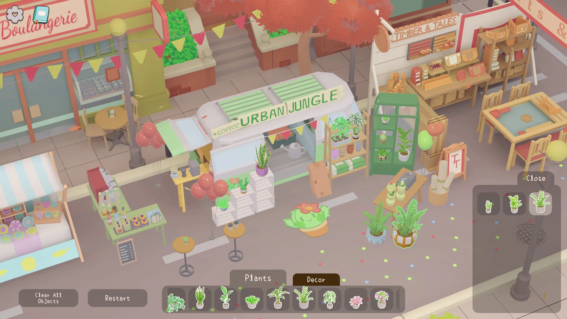 Street stall labelled Urban Jungle with potted plants, bunting, a boulangerie and a plant picker tray