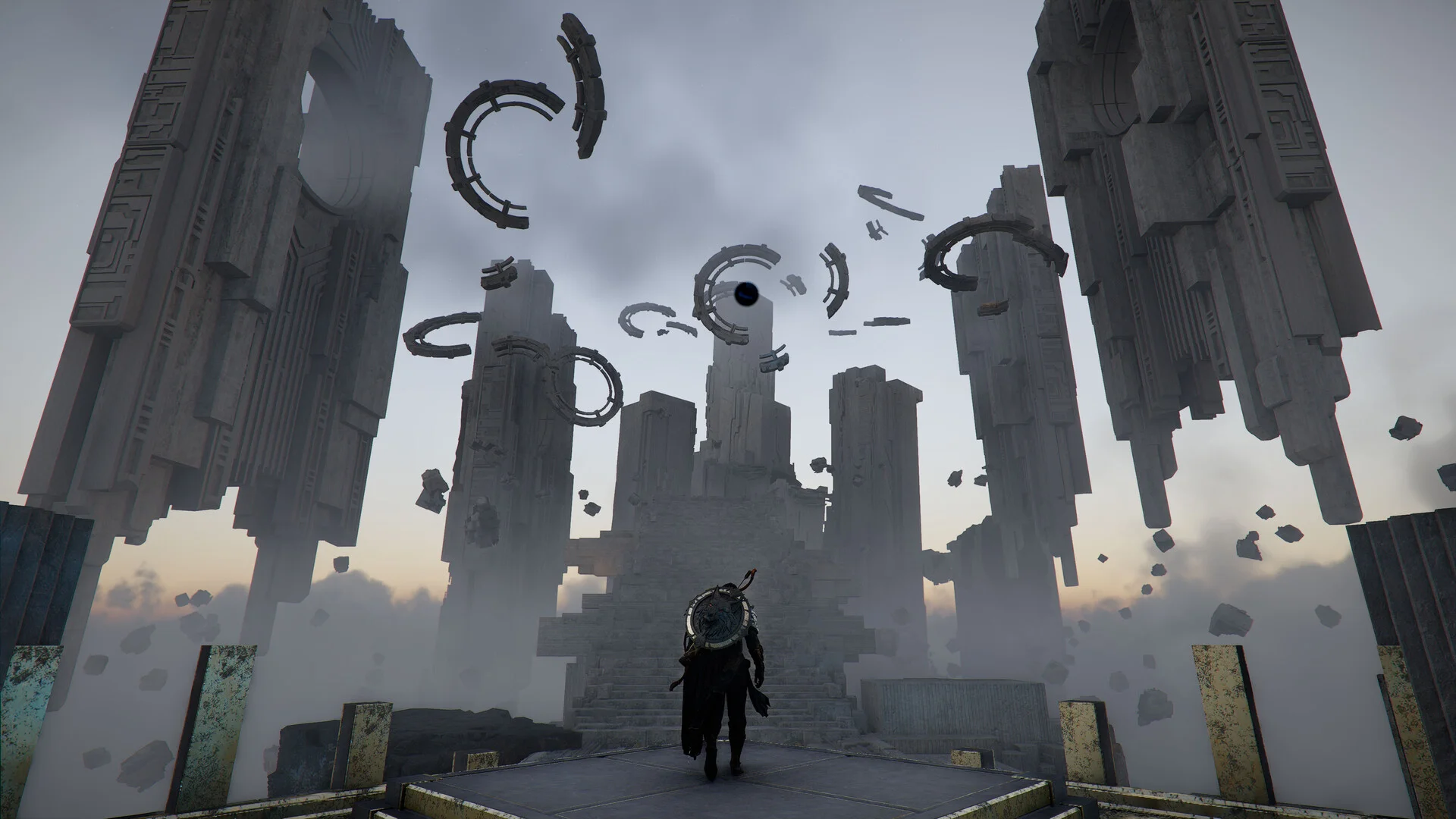 A figure faces floating stone towers and broken rings in a grey sky