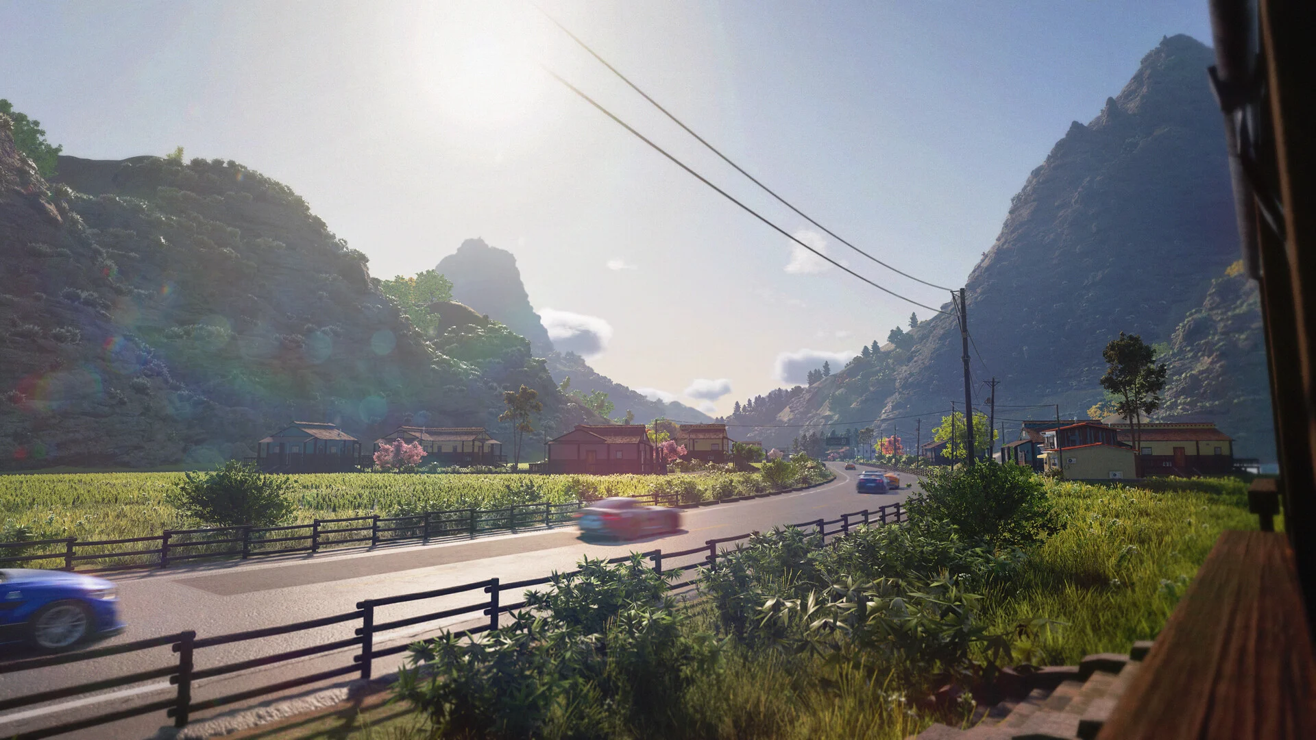 Mountain valley road, wooden fence, village houses, two cars racing, rice fields on the left, sun flare