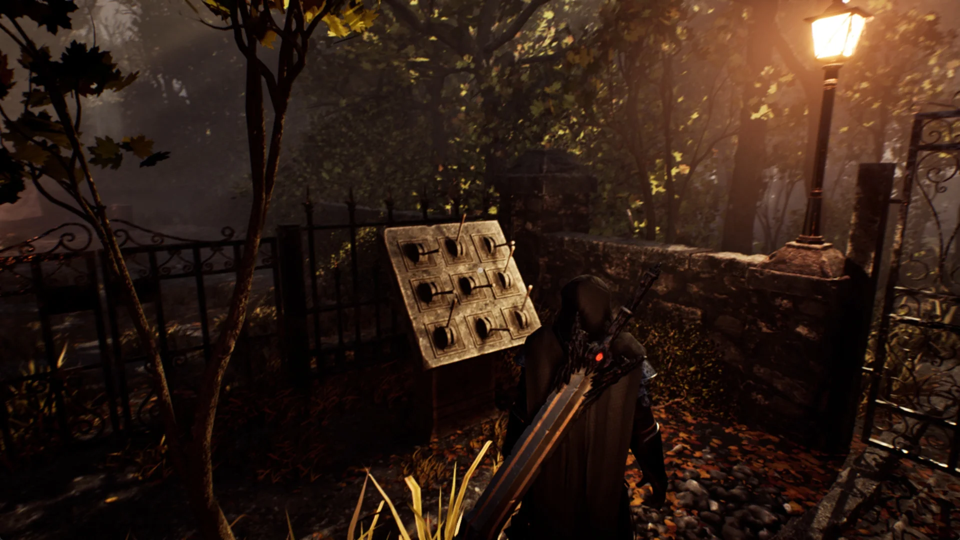 Hooded figure with a huge sword at a graveyard lamp, stone wall, iron fence and a nine-cup puzzle slab