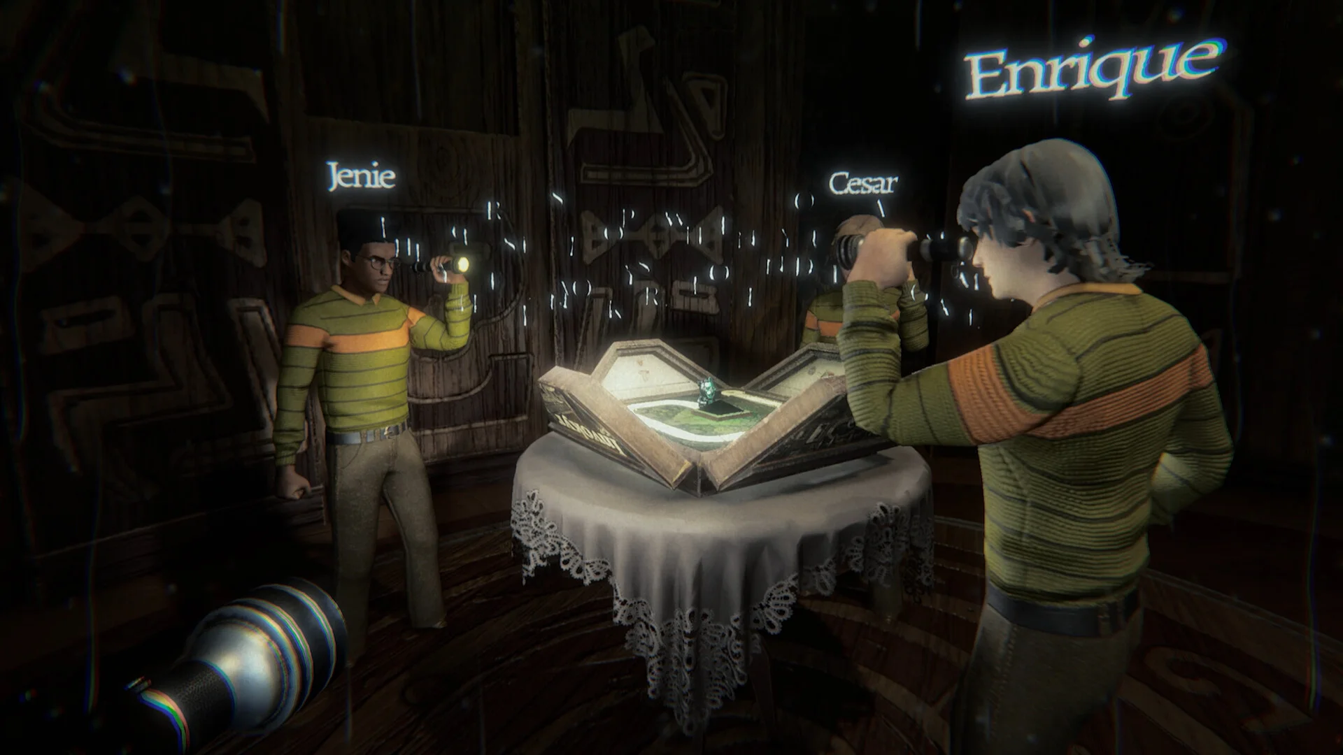 Wood-paneled room: Jenie with a flashlight, Cesar at a lace-covered table, Enrique filming, glowing Invokyr board between them, torch in the foreground